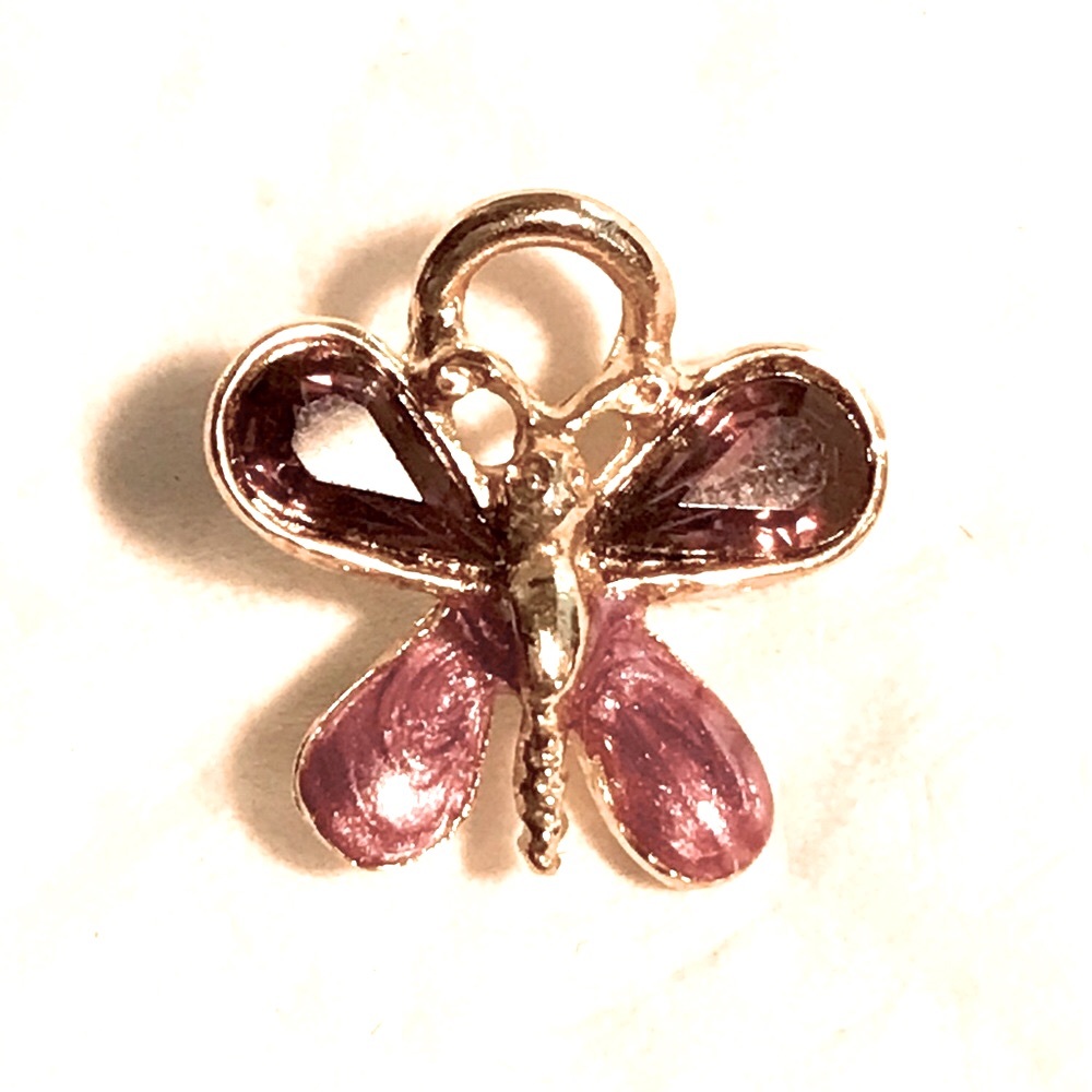 This Guardian Angel lapel pin is a beautiful butterfly with Amethyst & gold tone